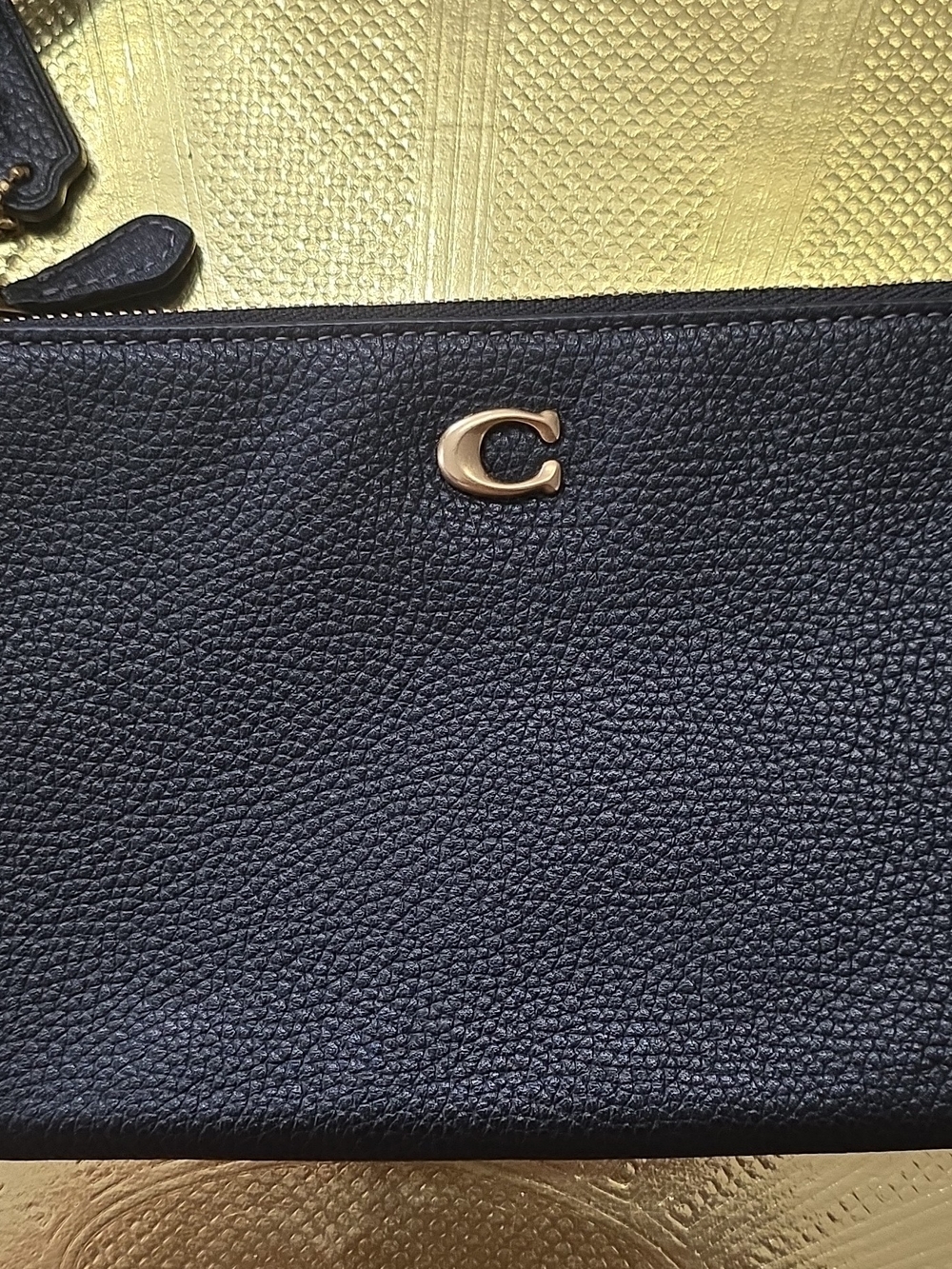 Coach Black Pebbled Leather Wristlet with Gold 'C' Emblem